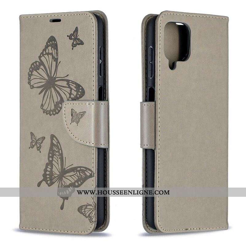 Housse Samsung Galaxy A12 / M12 Les Papillons en Vol avec Lanière
