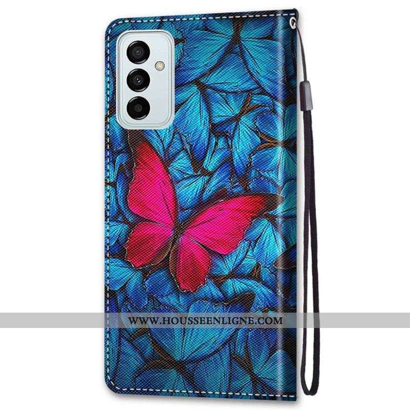 Housse Samsung Galaxy M23 5G Papillon Rouge Sur Fond Bleu