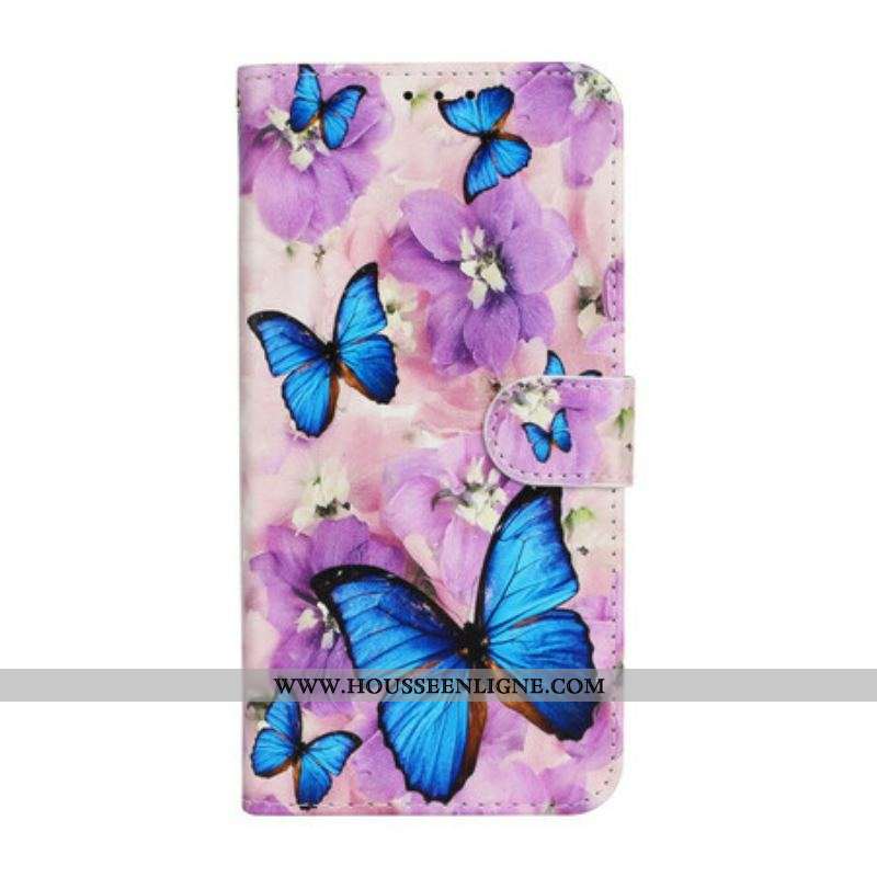 Housse iPhone 13 Mini Papillons Bleus dans les Fleurs