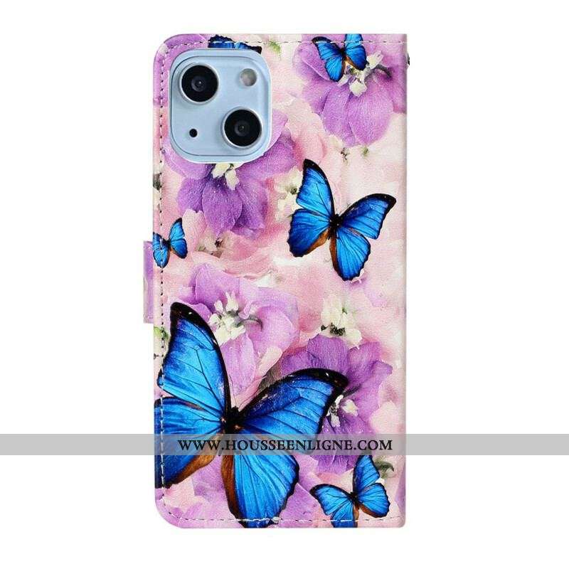 Housse iPhone 13 Mini Papillons Bleus dans les Fleurs