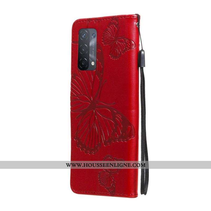 Housse Oppo A74 4G Papillons Géants à Lanière