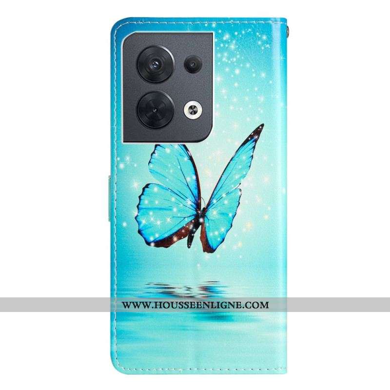 Housse Oppo Reno 8 Papillons Bleus à Lanière