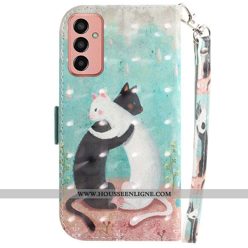 Housse Samsung Galaxy M13 Dancing Cats avec Lanière