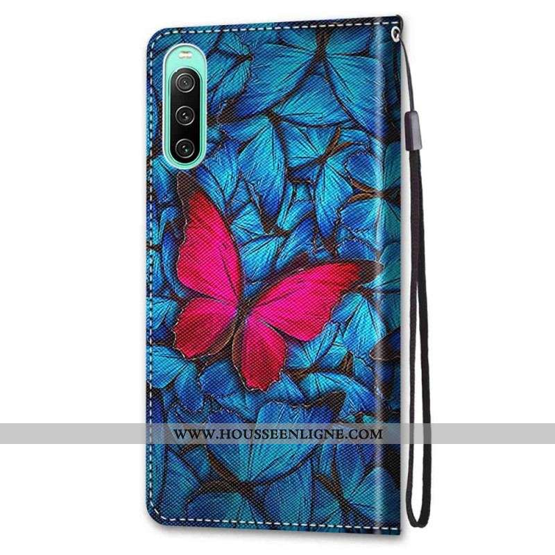 Housse Sony Xperia 10 IV Papillon Rouge Sur Fond Bleu