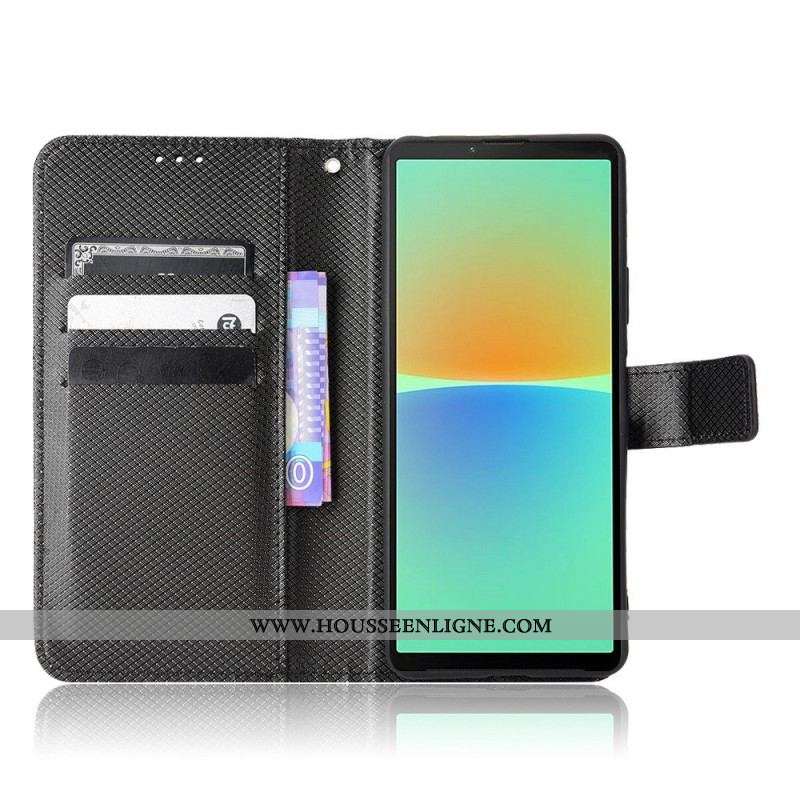 Housse Sony Xperia 10 IV Simili Cuir Stylé à Lanière
