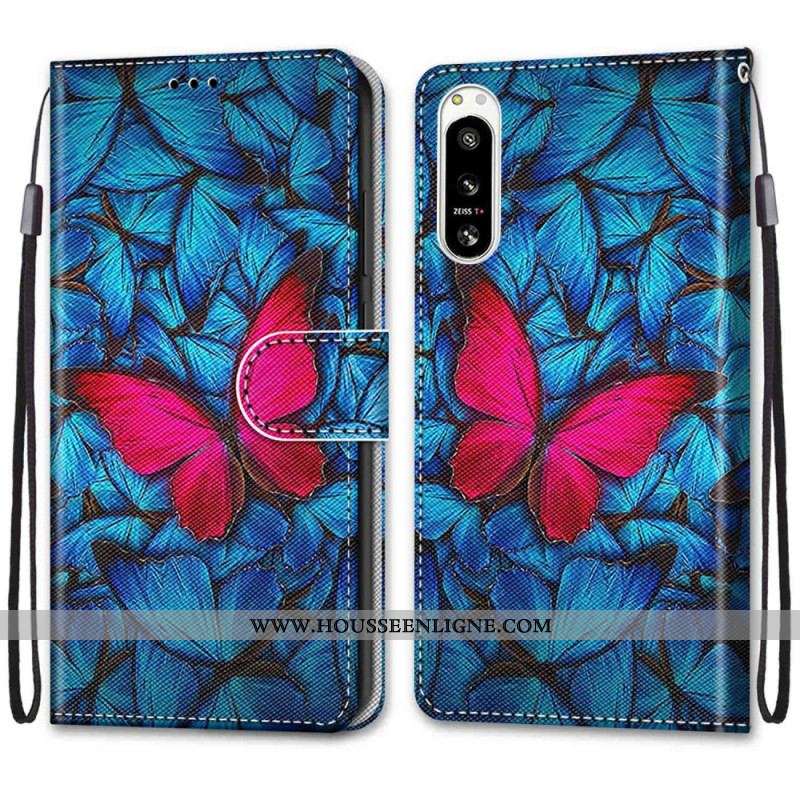 Housse Sony Xperia 5 IV Papillon Rouge Sur Fond Bleu