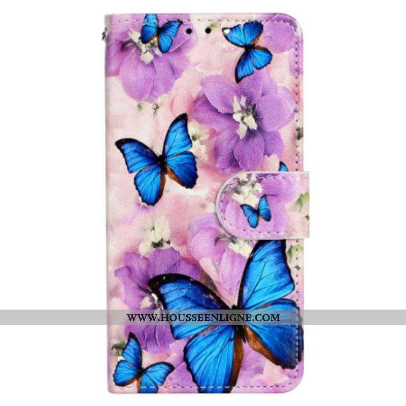 Housse iPhone 15 Plus Petits Papillons Bleus à Lanière