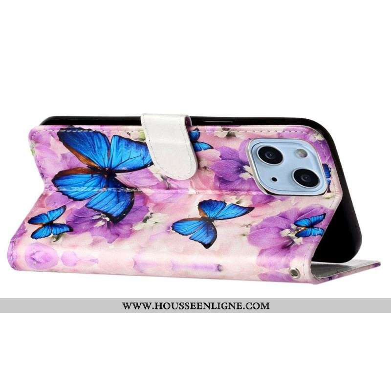 Housse iPhone 15 Plus Petits Papillons Bleus à Lanière